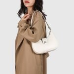 Modern Oval Fancy Shoulder Bag with Curved Lock - Image 19