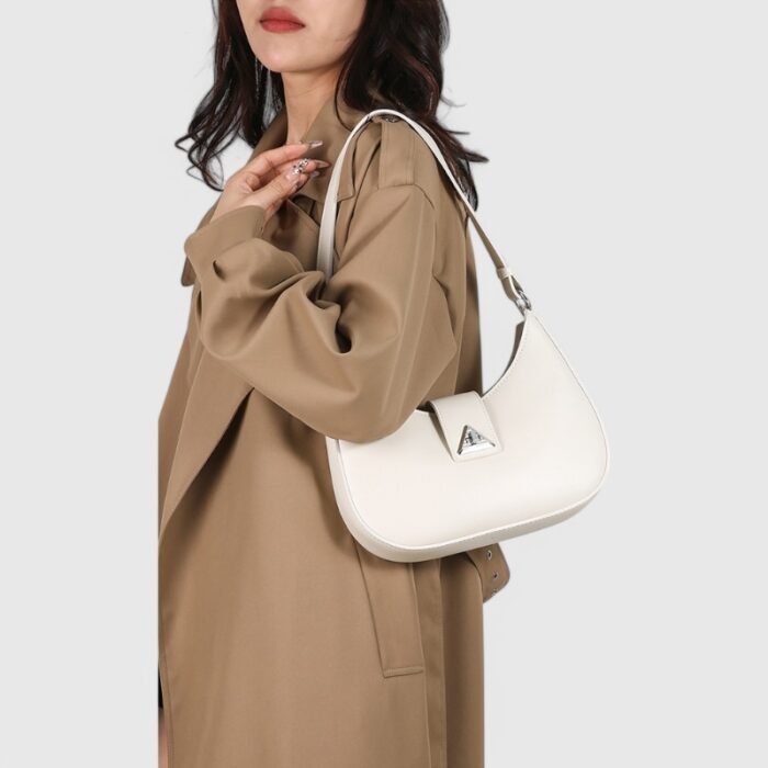 Modern Oval Fancy Shoulder Bag with Curved Lock - Image 19