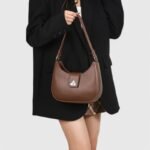 Modern Oval Fancy Shoulder Bag with Curved Lock - Image 16