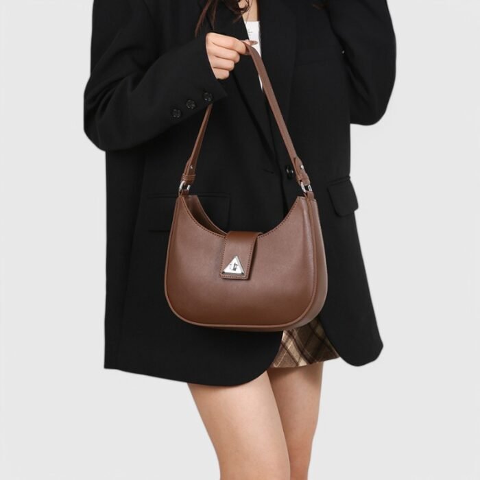 Modern Oval Fancy Shoulder Bag with Curved Lock - Image 16