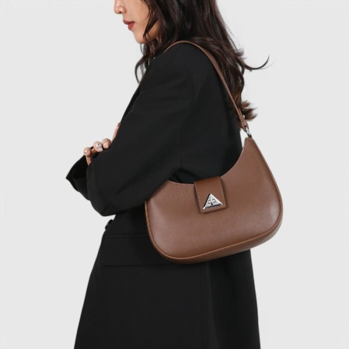 Modern Oval Fancy Shoulder Bag with Curved Lock - Image 17