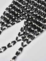 Artisan Cylindrical Woven Crossbody black + white beads bag